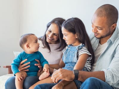 Family together on couch