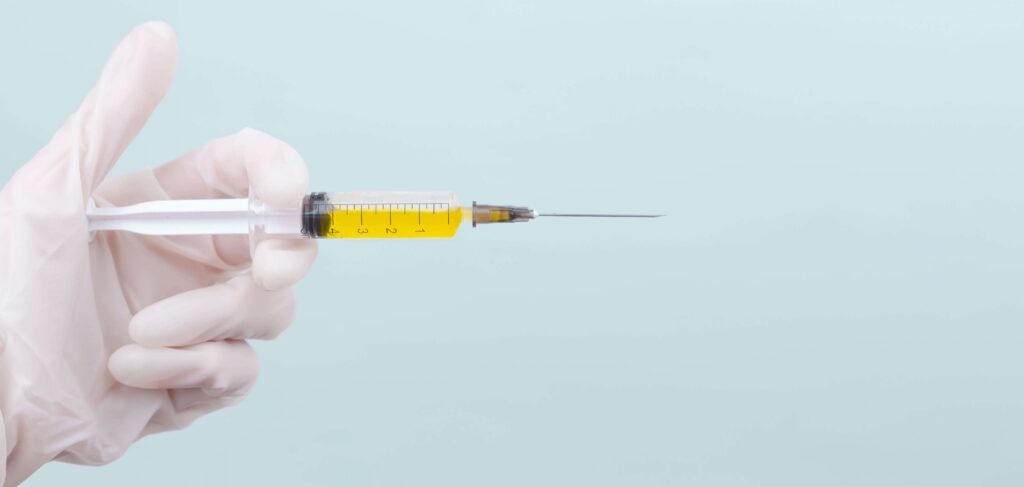 COVID Vaccine with needle