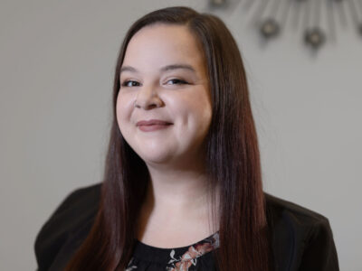 A portrait of Kelsey Tohill, at West Legal Lawyers in Calgary, Alberta, Canada