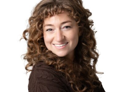 Portrait of Alyssa Perron, the Operations Coordinator at West Legal lawyers in Calgary, Alberta, Canada